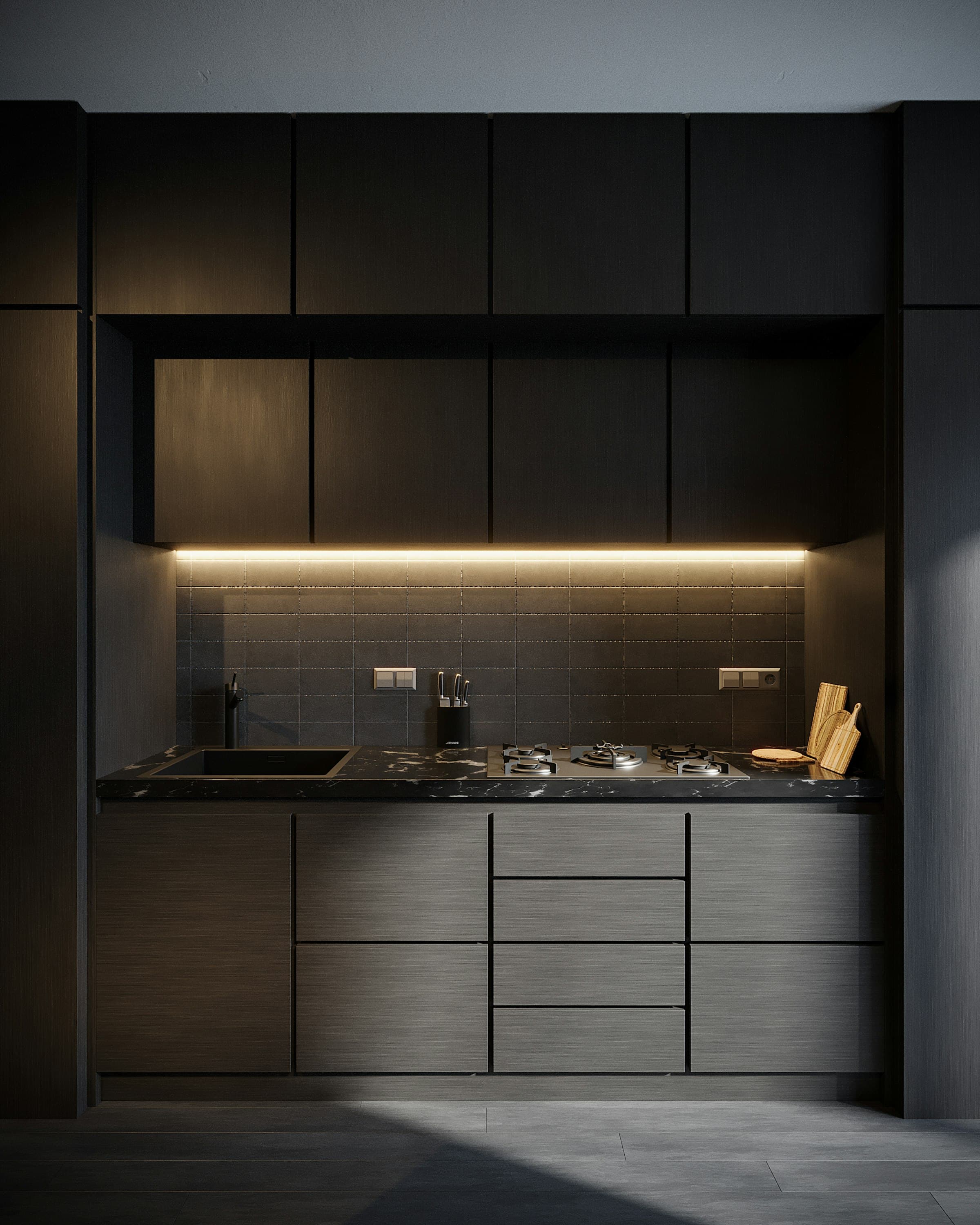 Donkere keuken met led-verlichting onder de bovenkasten
